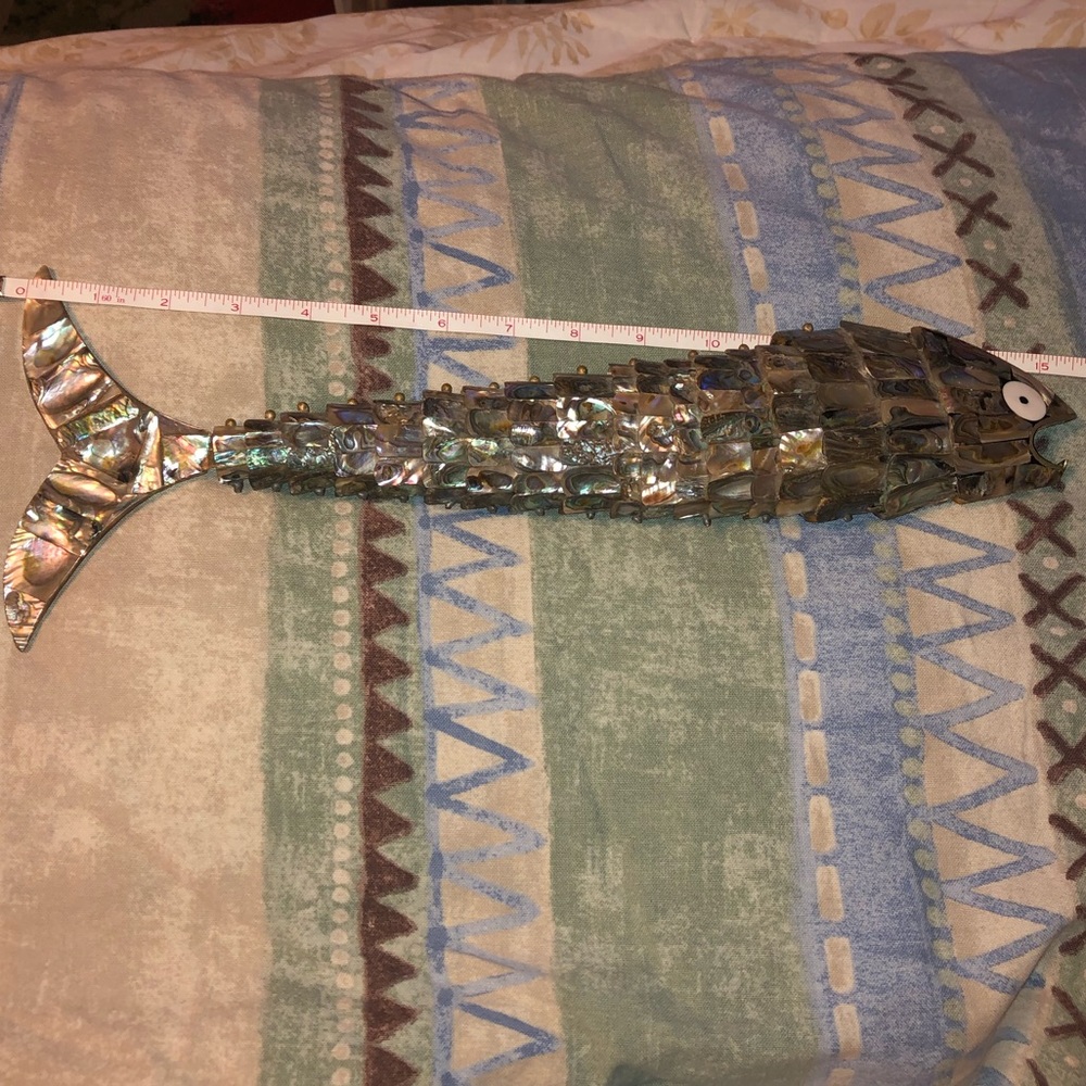 Abalone fish bottle opener.